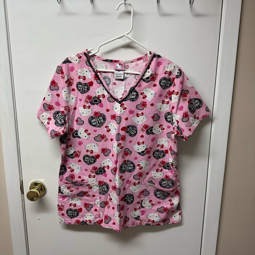 Women’s scrub top, excellent condition.